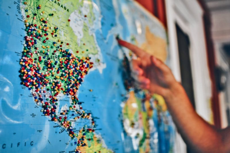 Person pointing at map