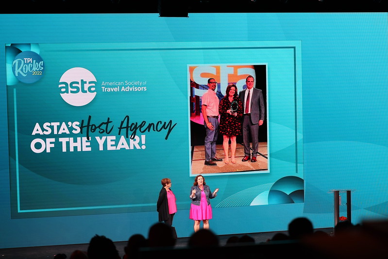 ASTA-Host-Travel-Agency-Of-The-Year Travel Planners International receiving the ASTA Host Travel Agency of the Year Award