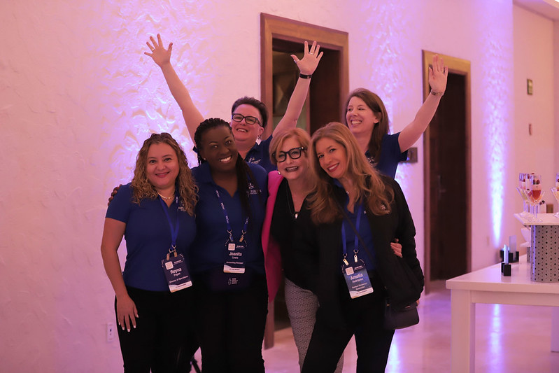 host-travel-agency-benefits Happy group of TPI Rockstars