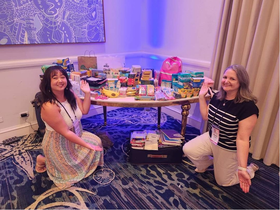 Theresa and Michele beam with joy in front of the donations brought by TPI Advisors in Nassau, Bahamas. This was only the beginning of our collection.